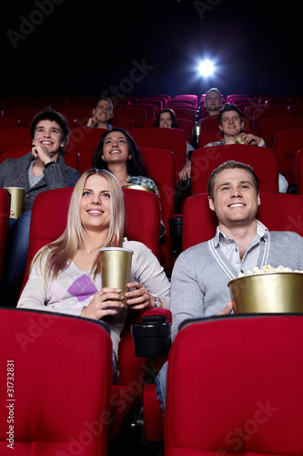Foto: Happy people in the cinema Happy people in the cinema