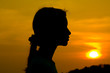 Photo: Silhouette of girl at sunset Silhouette of girl at sunset