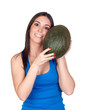 Beautiful girl with a green melon