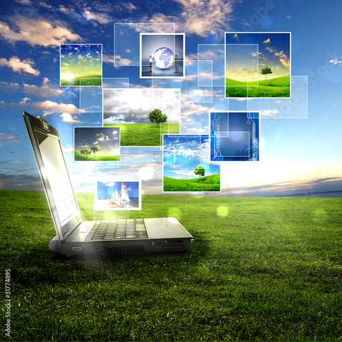 Photo: notebook against green nature background notebook against green nature background