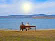 Elderly couple on a bench