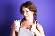 woman enjoying a glass of milk