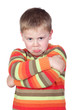 Angry child with crossed arm