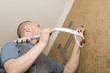 Air conditioning technician installs a new air conditioner