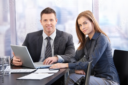 Photo: Young businesspeople having meeting Young businesspeople having meeting