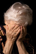 Photo: Portrait of the old woman a black background Portrait of the old woman a black background