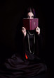 Gothic girl with the Bible
