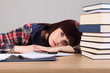 ����: Young student tired from homework head on desk � Darrin Henry #31827617