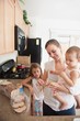 A Mother Making A Sandwich For His Girls