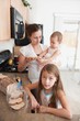 A Mother Making A Sandwich For His Girls