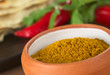 Curry spice in small bowl