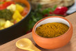 Curry spice in small bowl
