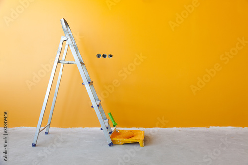 Photo: Home Improvement / ladder, paint can and paint roller Home Improvement / ladder, paint can and paint roller