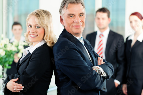 Photo: Business - team in an office Business - team in an office