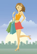 Happy young woman after shopping in the city