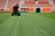 mowing grass
