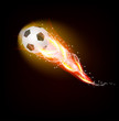 Vector: Football ball in fire on dark background Football ball in fire on dark background