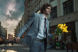Attractive guy with bunch of tulips