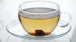 Woman mixes brown sugar in glass of tea