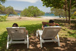 Two people taking a break in Coco Beach, Costa Rica