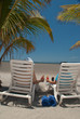 Couple enjoys a daiquiri at the beach