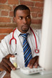 Young doctor prescribing medication