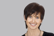 Photo: Close up portrait of a happy smiling woman Close up portrait of a happy smiling woman