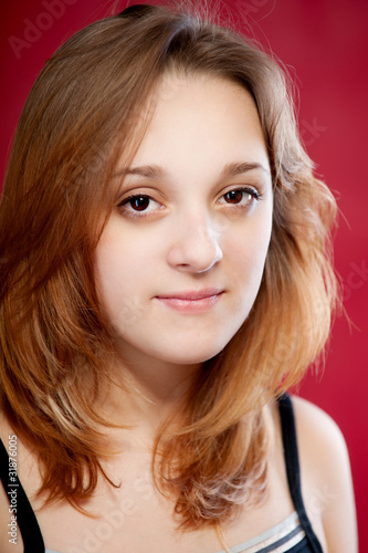 Photo: Young beautiful woman in a black top Young beautiful woman in a black top