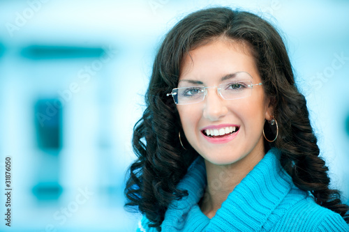 Photo: Young business woman with glasses Young business woman with glasses