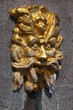 Ancient golden fountain statue