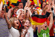 Foto: young and aged german soccer fans young and aged german soccer fans