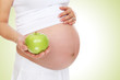 Pregnant Woman Holding Apple Pregnant Woman Holding Apple