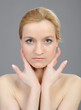 Pretty womans face with pure healthy skin