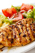 Grilled chicken fillets and vegetables