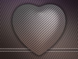 Carbon fibre heart on stetiched background