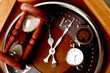 Brown watch, clock and hourglass