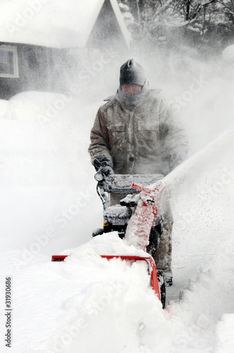 Photo: Man snowblowing Man snowblowing
