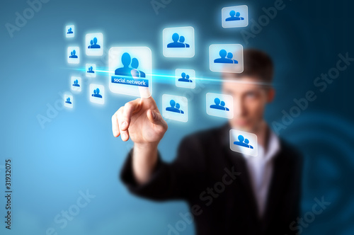 Photo: A businessman working on modern technology A businessman working on modern technology