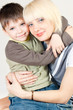 Mama hugs her son