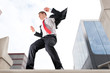 Jumping young business man