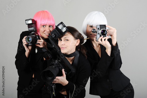 Photo: three girls with cameras three girls with cameras