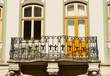 Facade of a building with a balcony. Facade of a building with a balcony.
