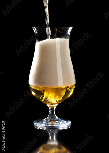 Photo: Pouring a beer Pouring a beer