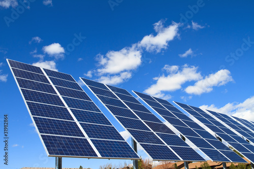 Photo: solar panels over blue sky solar panels over blue sky