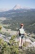 Woman Hiking In The Mountains