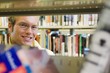 Young Man In A Library