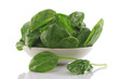 fresh spinach in a white bowl