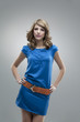 tall woman posing blue dress