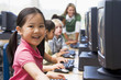 Foto: Kindergarten children learning how to use computers. Kindergarten children learning how to use computers.