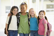 Four kindergarten girls standing together